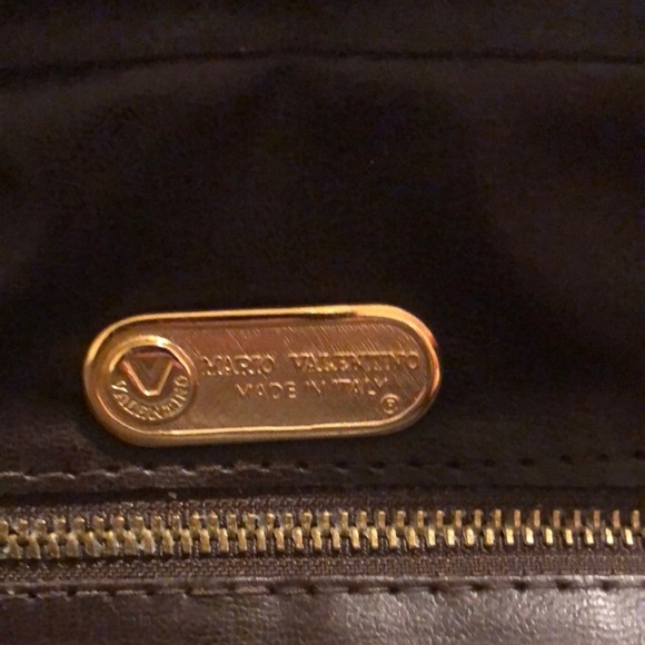 Mario Valentino Crossbody Bag
Mario Valentino
Size: 11 × 8 × 3.5 - Picture 9 of 11